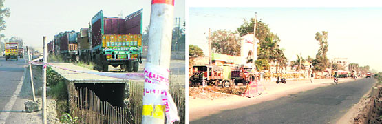 Pointed iron rods; and (right) uncovered trenches pose risk to commuters on the National Highway-1 near Sahnewal. photo by writer