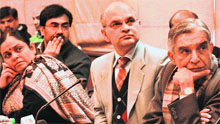 (R-L) Railway Minister Pawan Kumar Bansal, UT Adviser KK Sharma and UIDAI deputy director general Keshni Anand Arora at the launch of the direct cash transfer scheme in Chandigarh on Tuesday.