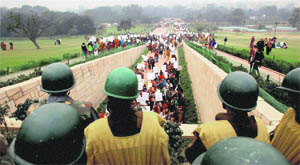 Women participate in the Mahila Suraksha Samman March at Rajghat. 