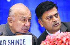 Union Home Minister Sushilkumar Shinde with Home Secretary RK Singh at the conference of Chief Secretaries and DGPs in New Delhi on Friday.