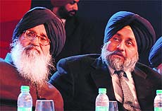 Punjab CM Parkash Singh Badal and Deputy CM Sukhbir Singh Badal at the NRI Sammellan in Chandigarh on Friday. 