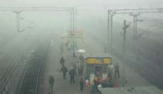 Dense fog engulfs the Ambala railway station on Friday.