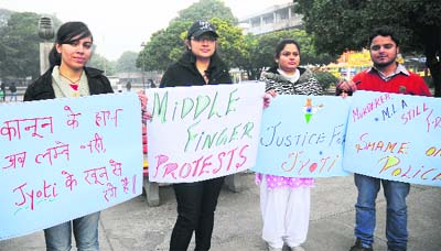 People hold a protest against the Haryana police in connection with the Jyoti murder case at Sector 17, Chandigarh, on Saturday.