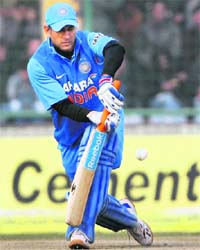 MS Dhoni plays a shot against Pakistan during the last ODI at Ferozshah Kotla in New Delhi on Sunday. India clinched a sensational 10-run victory in a low-scoring thriller to avoid a series whitewash.