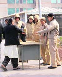 Tight security outside the Saket Court where a fast-track court is hearing the gang rape case