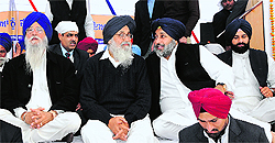 Akali leader Ranjit Singh Brahmpura, CM Parkash Singh Badal, Dy CM Sukhbir Badal and Revenue Minister Bikram Majithia at Maghi Mela on Sunday