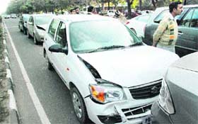 Bang bang: Cars involved in a pile-up on the road separating Sectors 9 and 17 in Chandigarh on Monday