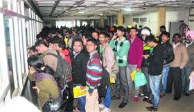 Heavy rush at the Registering and Licensing Authority at Sector 17 in Chandigarh on Monday