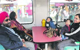 A family enjoys the VIP treatment aboard the third Shatabdi in Chandigarh on Monday