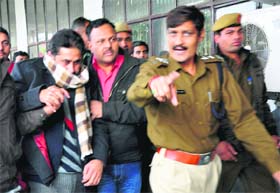 Accused Ram Kumar Chaudhary being produced in a court at Panchkula on Monday