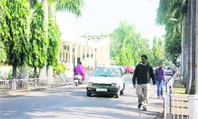 Vehicles ply in a planned vehicle-free zone at the PEC University of Technology in Sector 12, Chandigarh, on Monday