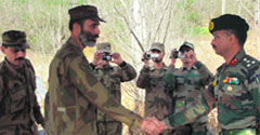 Commander of the 10th Brigade, Brig TS Sandhu (R) with his Pakistani counterpart Faisal in Poonch on Monday.