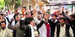 INLD supporters protest against the verdict outside a Delhi court on Tuesday.