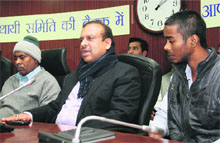 Victims father (extreme left) and her brother (R) at a press conference in New Delhi on Tuesday.