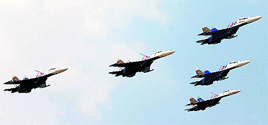 Russian Su-27 fighters perform on the 3rd day of Aero India at Yelahanka Airbase near Bangalore on Friday