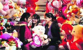 Girls are all smiles as they select teddy bears on the occasion of Teddy Day in Ludhiana on Sunday.