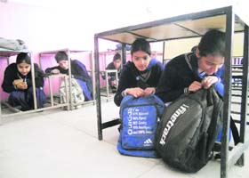 Immediate response: Students sit under benches to protect themselve at Government Model Senior Secondary School ,Sector 35, Chandigarh