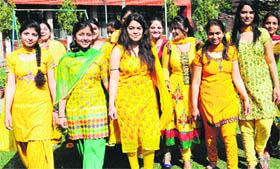Girls during Basant Panchami celebrations at the Postgraduate College for Girls in Sector 42, Chandigarh, on Thursday.