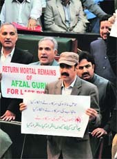 PDP legislators protest in the Assembly before it was adjourned on Friday. 