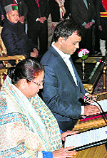 Himachal Governor Urmila Singh administers the oath to Anil Sharma in Shimla on Saturday