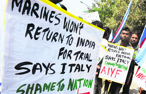 Activists protest near the Italian Embassy in New Delhi on Wednesday. 
