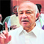 Union Home Minister Sushilkumar Shinde outside Parliament