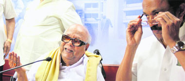 DMK chief M Karunanidhi with his son MK Stalin at a press meet in Chennai on Tuesday.