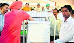 Draw of lots for liquor vends being held.
