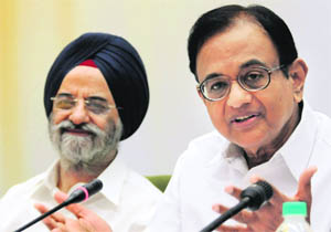 Finance Minister P Chidambaram with Finance Secretary RS Gujral during the National Editors Conference in New Delhi on Saturday. 