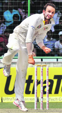 Australian off-spinner N Lyon in action during the fourth Test against India in New Delhi on Saturday. 