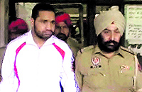 Ram Singh being produced in a Fatehgarh Sahib court on Thursday