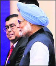 PM Manmohan Singh with Chief Justice Altamas Kabir in New Delhi on Sunday. 