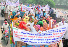 Villagers protest against land acquisition near Faridabad.