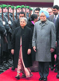 PM Manmohan Singh and his wife Gursharan Kaur at the Tegel Military Airport in Berlin on Wednesday