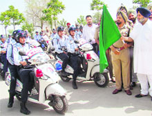 Sukhbir Badal flags off the Women Armed Special Protection Squad at Badal village on Sunday.