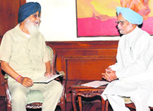 PM Manmohan Singh with Punjab CM Parkash Singh Badal in New Delhi on Monday.