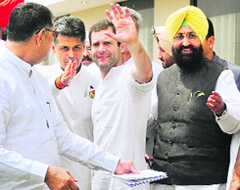 Congress vice-president Rahul Gandhi with Union Minister Manish Tewari and PPCC chief Partap Bajwa in Khanna on Friday.