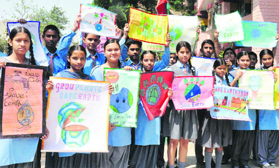 Students across the tricity schools took part in the World Earth Day celebrations on Monday.