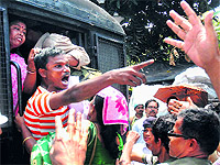 Investors and agents of chit fund companies demand refund of their money at Hazra in Kolkata on Thursday