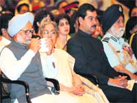 L to R: Prime Minister Manmohan Singh, Mrs Gursharan Kaur, MoS Defence Minister Jitender Singh, Marshal Arjan Singh during the Defence Investiture Ceremony - II at Rashtrapati Bhavan in New Delhi on Saturday
