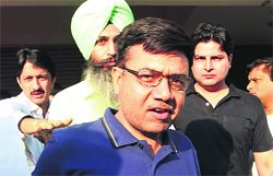 Vijay Singla, Railway Minister PK Bansals nephew, being taken to Delhi from Chandigarh on Saturday.