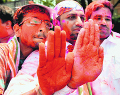 Congress supporters celebrate after their partys win in Bangalore.