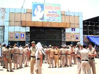 Police personnel outside ashram during sealing operation in Rohtak on Wednesday