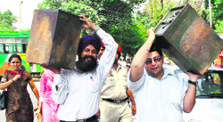 Polling staff on the eve of zila parishad and panchayat samiti elections in Patiala on Saturday.