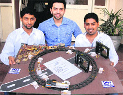 Students with their model of an unmanned level crossing