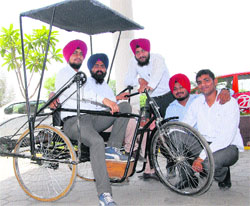 a tricycle for the physically impaired in Jalandhar on Friday.