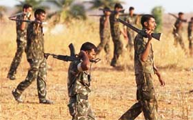 Paramilitary men comb a Maoist-hit area in Chhattisgarh