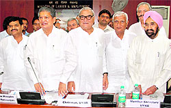 UP Irrigation Minister Shiv Pal Yadav, Union Water Resources Minister Harish Rawat, Haryana CM Bhupinder Hooda, Rajasthan Water Resources Minister Hema Ram and his Haryana counterpart HS Chattha at a meeting in New Delhi on Tuesday