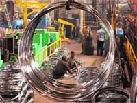 Workers at a cycle-manufacturing unit in Ludhiana