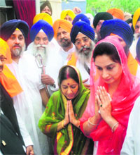 BJP leader Sushma Swaraj with Punjab Deputy CM Sukhbir Singh Badal and MP Harsimrat Kaur Badal at a function to lay the stone of the 1984 riots memorial inside the Rakab Ganj Sahib gurdwara complex in New Delhi. 